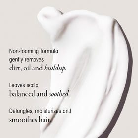 ORIBE Eternal Curls Cleansing Cream being poured demonstrates non-foaming cleansing.