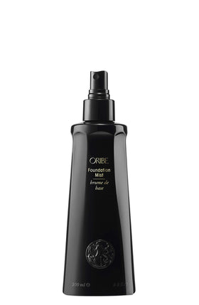 Oribe Foundation Mist apply hair—texture-friendly spray for satin finish and anti-static control.