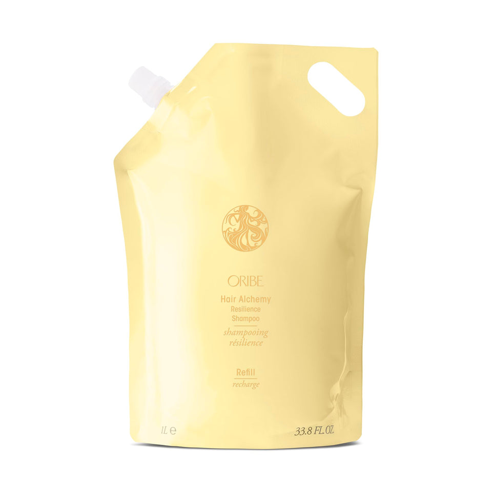 Oribe Hair Alchemy Resilience Shampoo bottle showcases strength for fragile hair