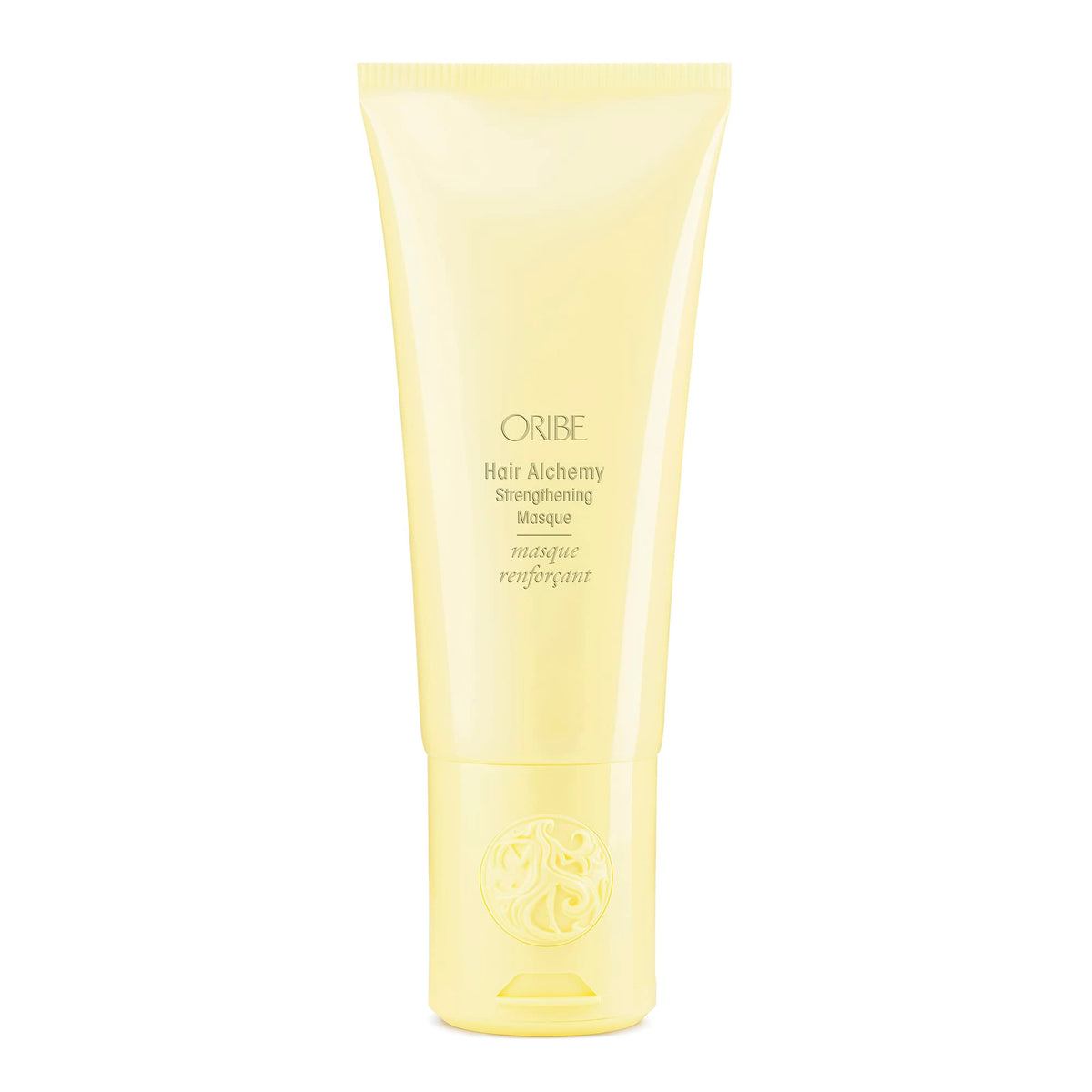 Oribe Hair Alchemy Strengthening Masque jar highlighting luxe conditioning for soft, resilient hair.