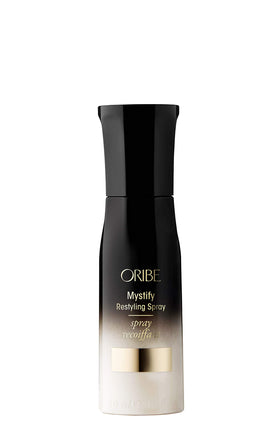 Oribe Mystify Restyling Spray bottle pour for easy restyling and protection