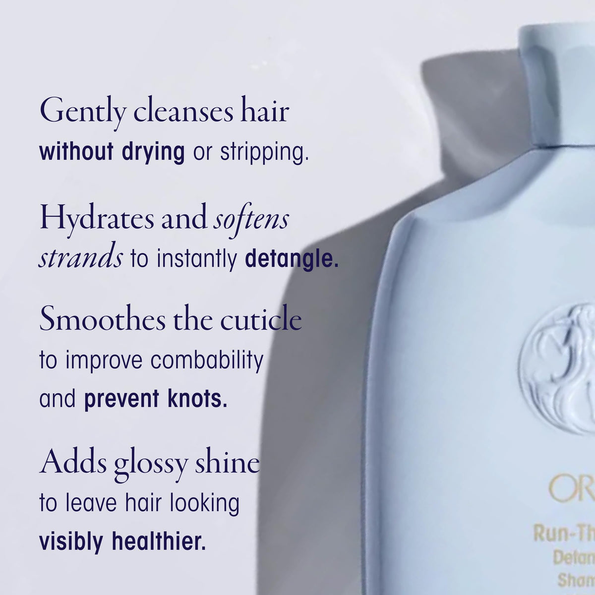 Oribe Run-Through Detangling Shampoo close-up bottle highlights shine