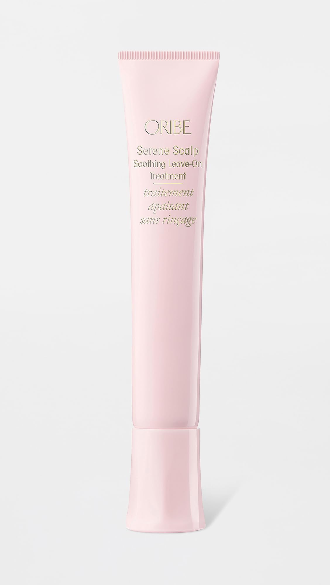 Oribe Serene Scalp cooling mint application demonstrates instant refreshing feel.