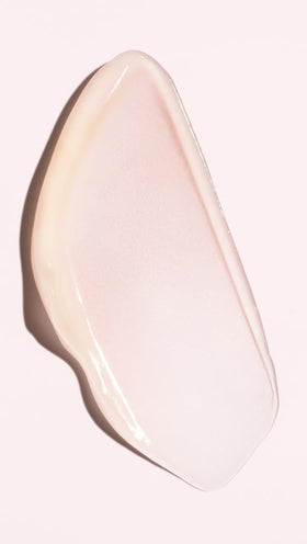 Oribe Serene Scalp flake removal closeup highlights gentle exfoliation.