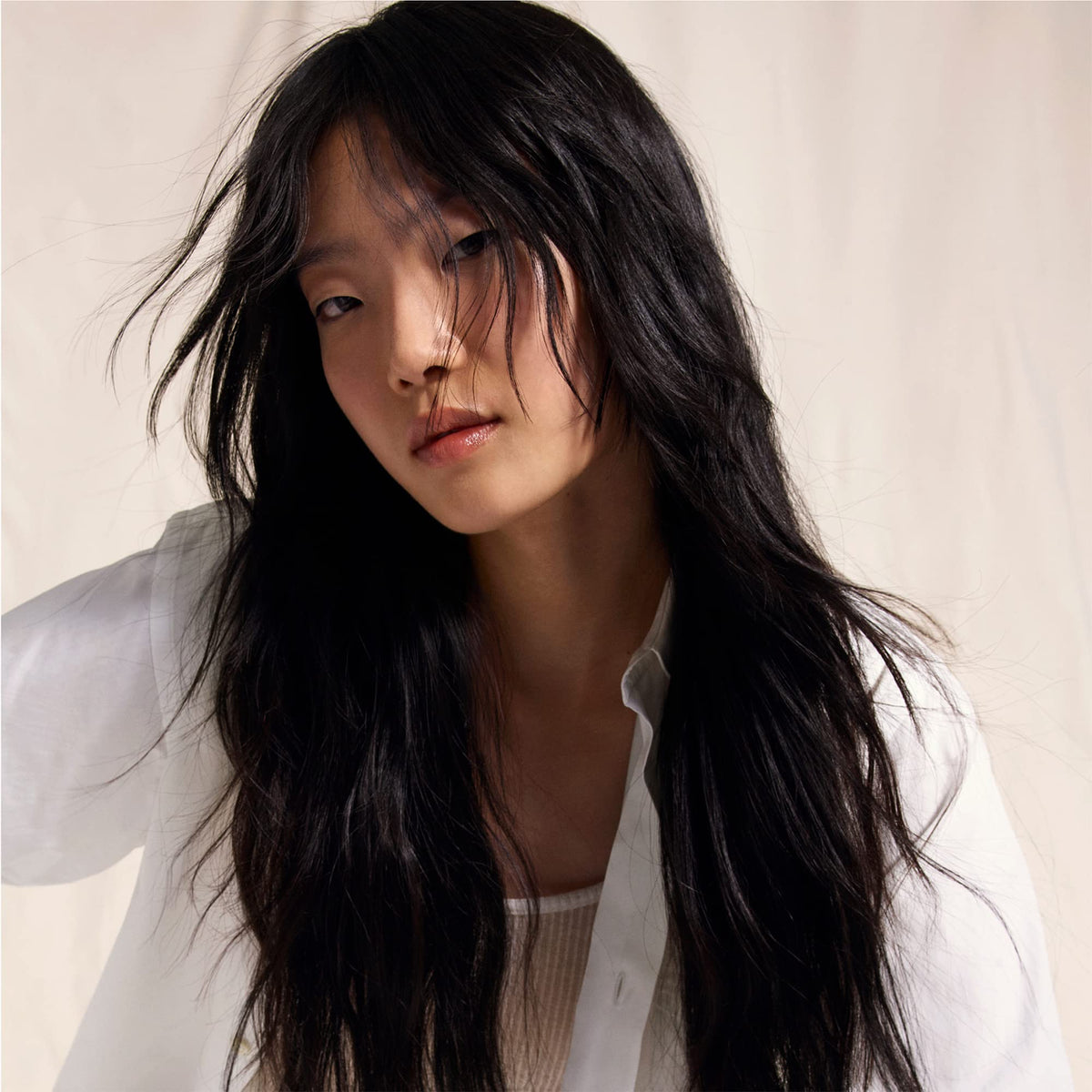 Oribe Serene Scalp Mist on clean hair delivering instant refresh