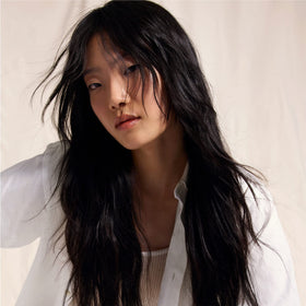 Oribe Serene Scalp Mist on clean hair delivering instant refresh