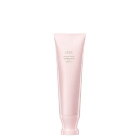 Oribe Serene Scalp Scrub bottle shown for cleansing and pore purification.