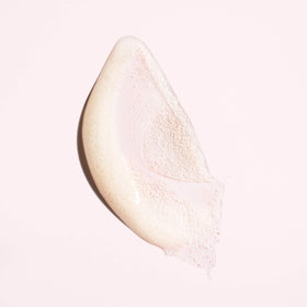 Front label of Oribe Serene Scalp Scrub highlighting vegan, sulfate-free formula.