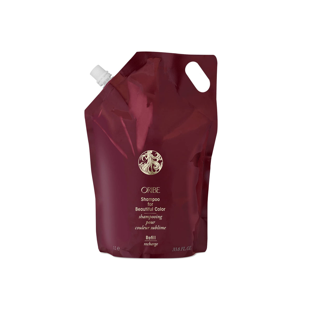 Oribe Beautiful Color bottle shows color protection for vibrant, fade-resistant hair.