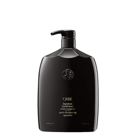 ORIBE Signature Conditioner bottle shows hydration for detangling and shine.