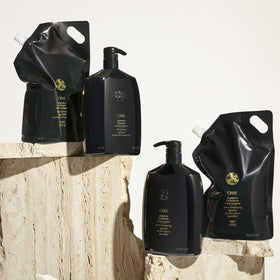 Oribe Signature Conditioner glossy finish on hair showing shine and smoothness.