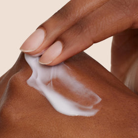 Origins Signature Ginger-Coriander-Clove scent swirls for warm fragrance.