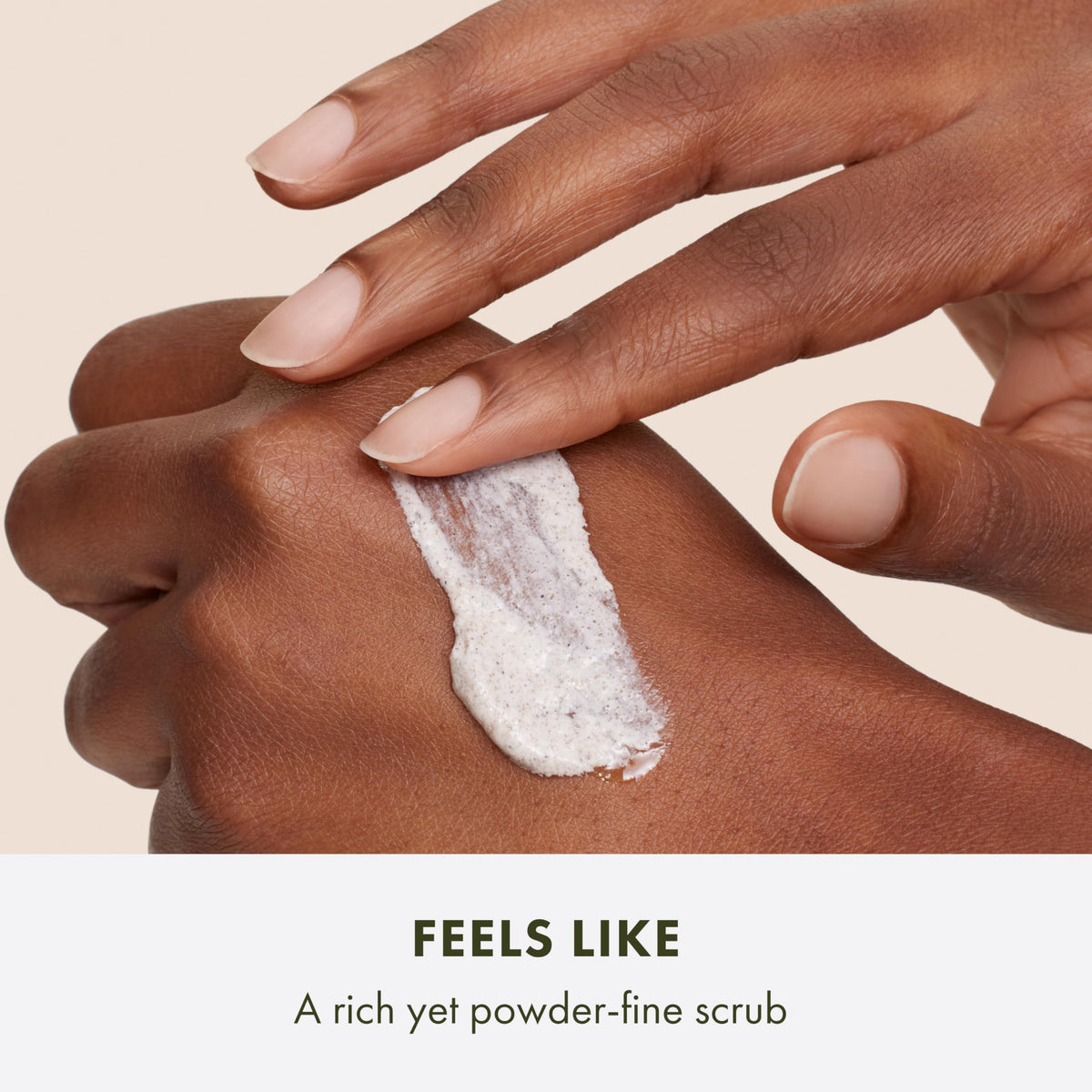 Origins Peace of Mind Scrub walnut shell powder texture showing buffing effect.