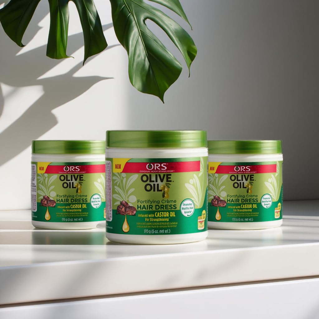 ORS Olive Oil Creme finished hair with shine and improved elasticity for smooth styling.