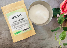 Oslove Organics beads shown in soap base for DIY scrubs