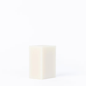Close-up of creamy lather from Osmia Naked Body Soap for gentle moisture.