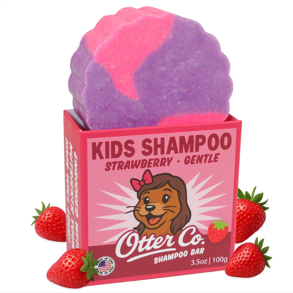 Otter Co Kids Gentle Strawberry Shampoo Bar packaging in eco box, travel-friendly option.