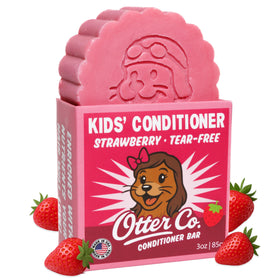 Otter Co Kids Strawberry Conditioner Bar packaging highlights an organic, sulfate-free formula for gentle cleansing.