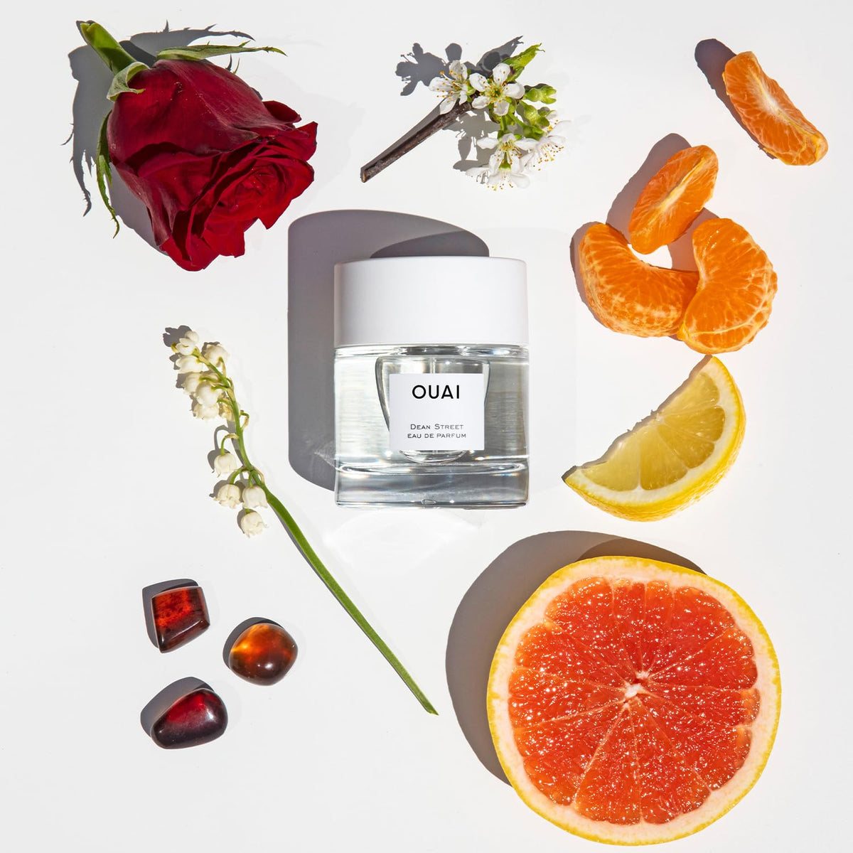 OUAI Dean Street EDP application on damp skin for lasting fragrance