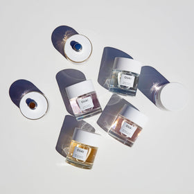 OUAI Dean Street EDP close-up notes imagery with amber hints