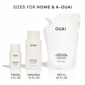OUAI in-store display bottle showcasing travel-friendly conditioner