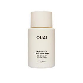 OUAI medium conditioner travel-size bottle for on-the-go hydration