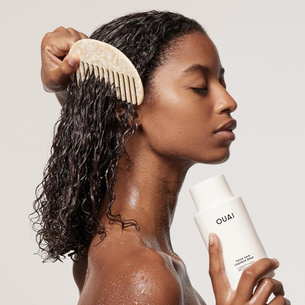 OUAI Thick Hair Conditioner texture close-up showing rich hydration for thick hair.