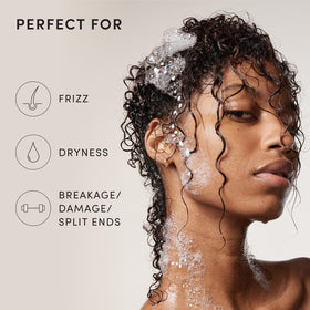 OUAI Thick Hair Shampoo keratin smooths frizz and adds shine