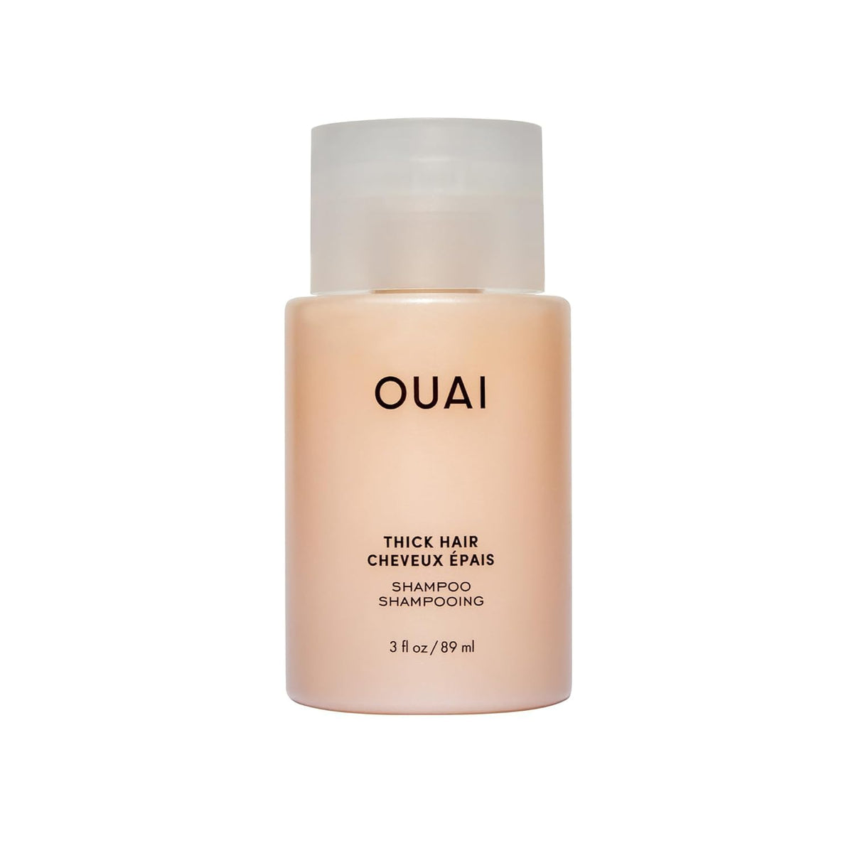 OUAI Thick Hair Shampoo travel-size bottle for moisture and frizz control