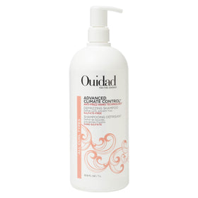 Ouidad Advanced Climate Control Defrizzing Shampoo bottle shows frizz prevention for all curls