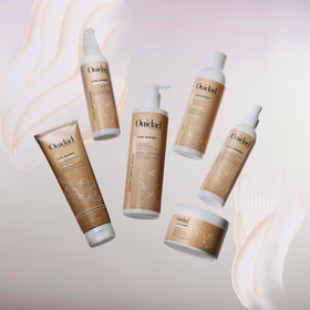 Applying to coils highlights smooth detangling and styling prep.