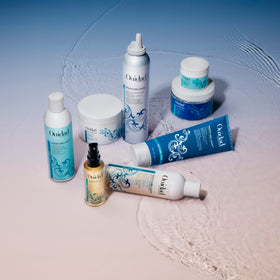 Ouidad Moisture Lock Extreme Hold Gel texture close-up showing clear, flake-free finish