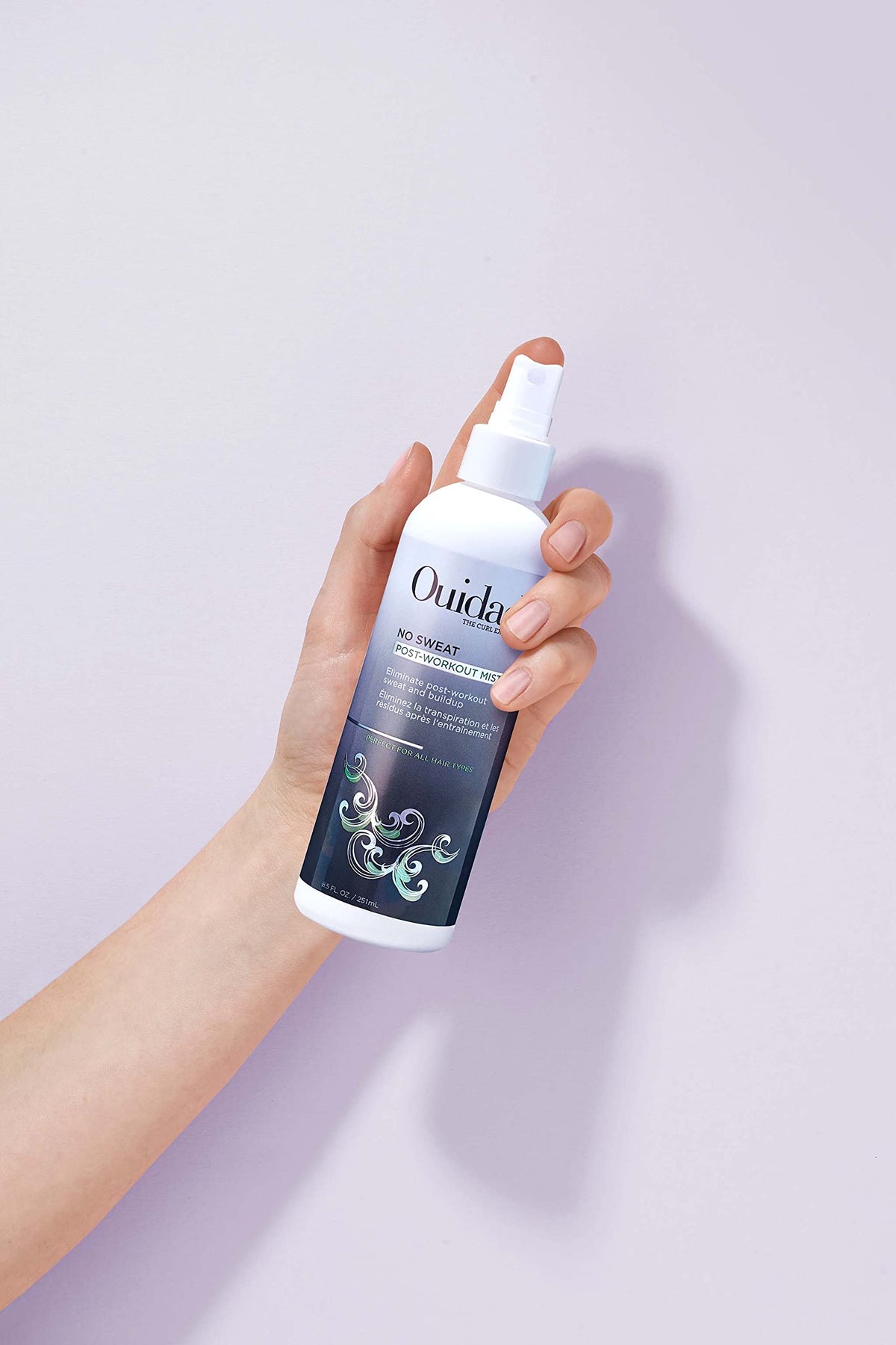 Ouidad No Sweat Post-Workout Mist spray quickly refreshes scalp and eliminates odor.