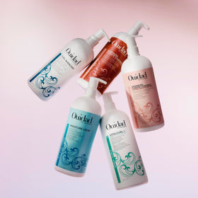 Ouidad logo on packaging signals premium curl care for daily routines.