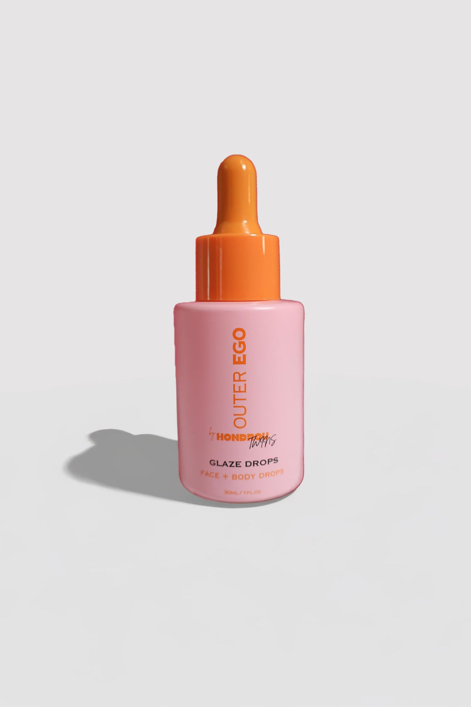Outer Ego by Hondroutwins Face and Body Drops pour for customizable glow and even skin tone.