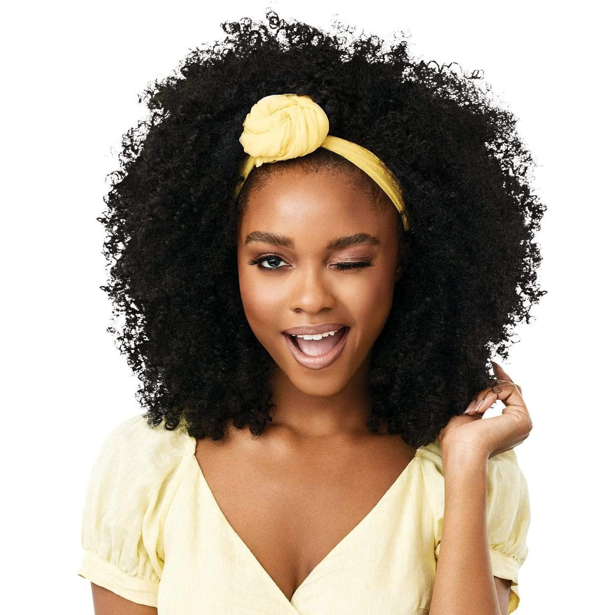 Outre Braids Bahama Mama wig back view reveals full coverage and bounce.
