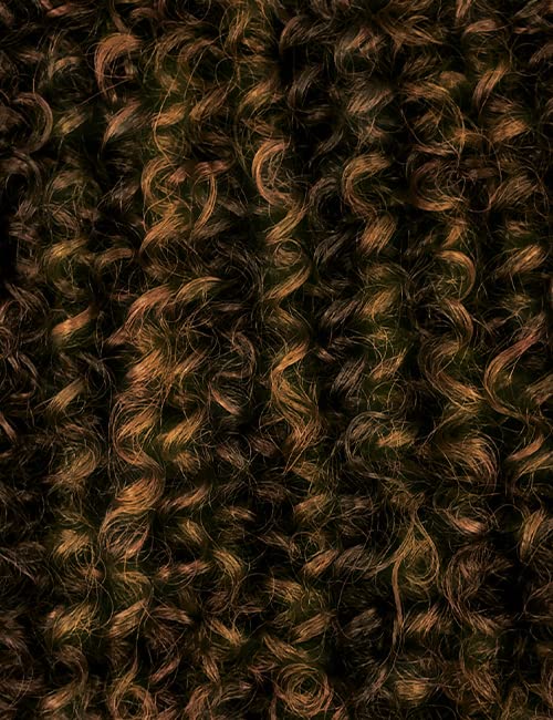 Outre PERUVIAN Batik Half Wig back view with secure placement.