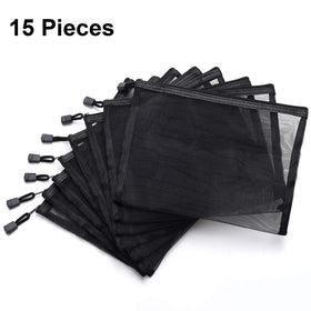 Outus cosmetic pouch in mesh for travel organization and compact packing.