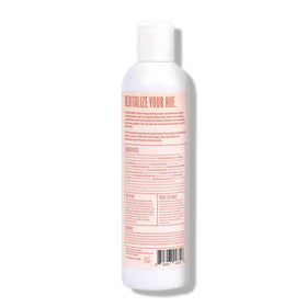 Applying oVertone Desert Rose after shampoo to refresh tone and shine
