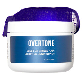 Overtone Indigo Iris color conditioner bottle pouring for at-home color refresh