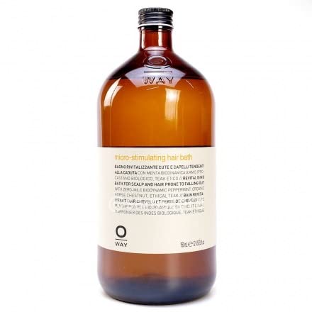 OWAY Micro-Stimulating Hair Bath bottle pour promotes scalp revitalization and hair vitality.