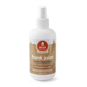 Oyin Handmade Frank Juice leave-in bottle highlighting herbal formula for softer curls.
