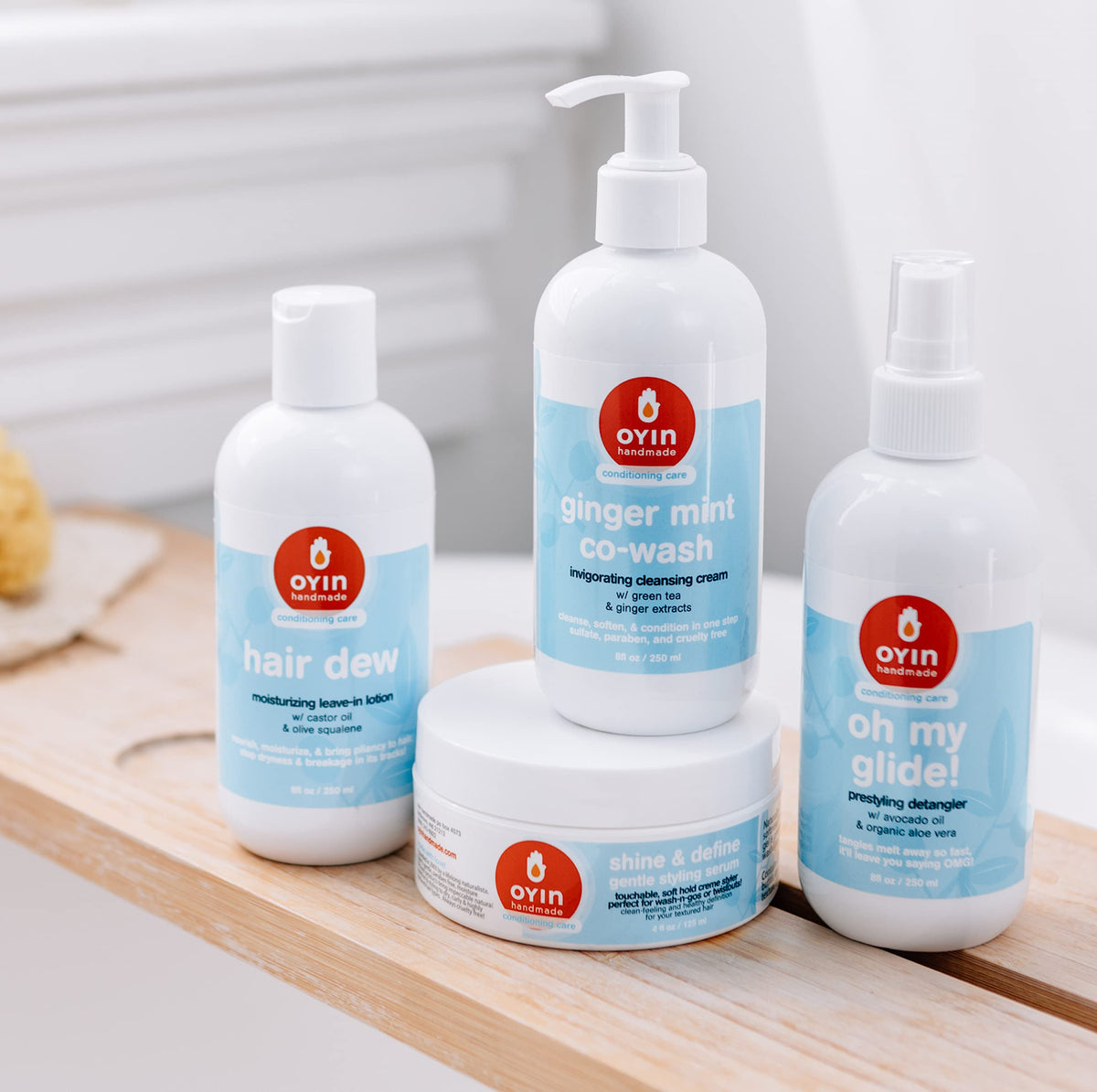 Oyin Hair Dew ingredients: castor oil and olive squalane nourish