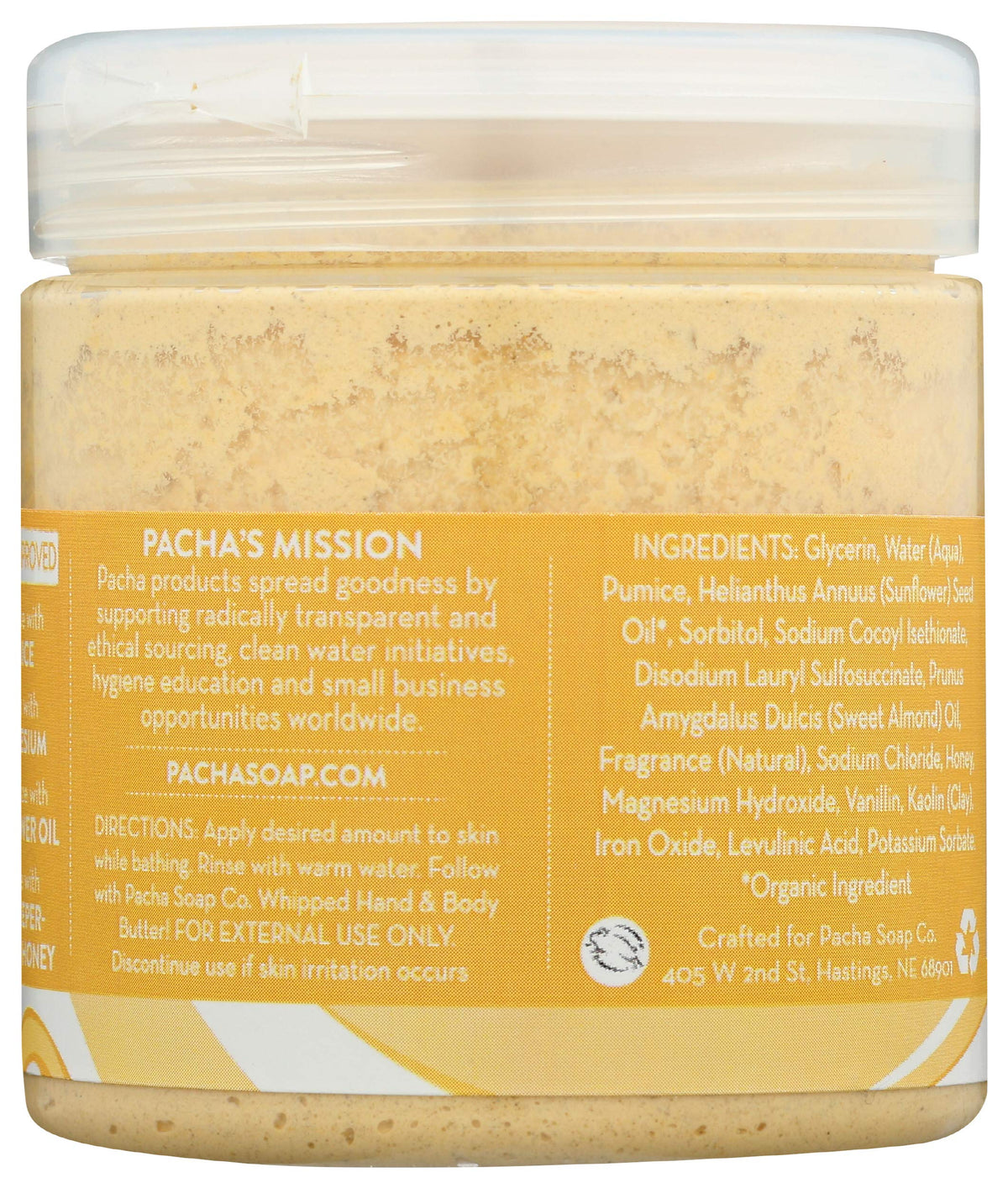 Hand applying vanilla almond whipped scrub for gentle exfoliation