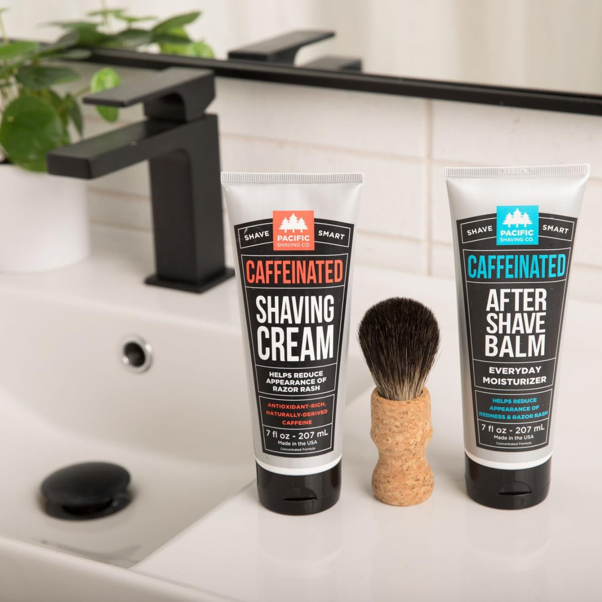 Pacific Shaving Company caffeinated aftershave bottle with cooling mint for refreshed skin.