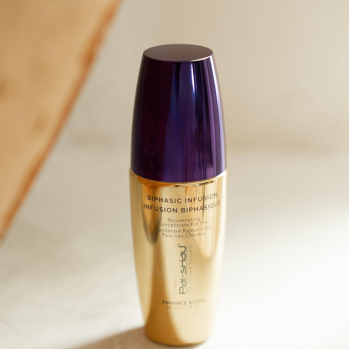 Pai-Shau Biphasic Infusion silky gloss finish on hair.