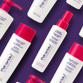 Lifestyle shot of voluminous hair using Pai-Shau product.
