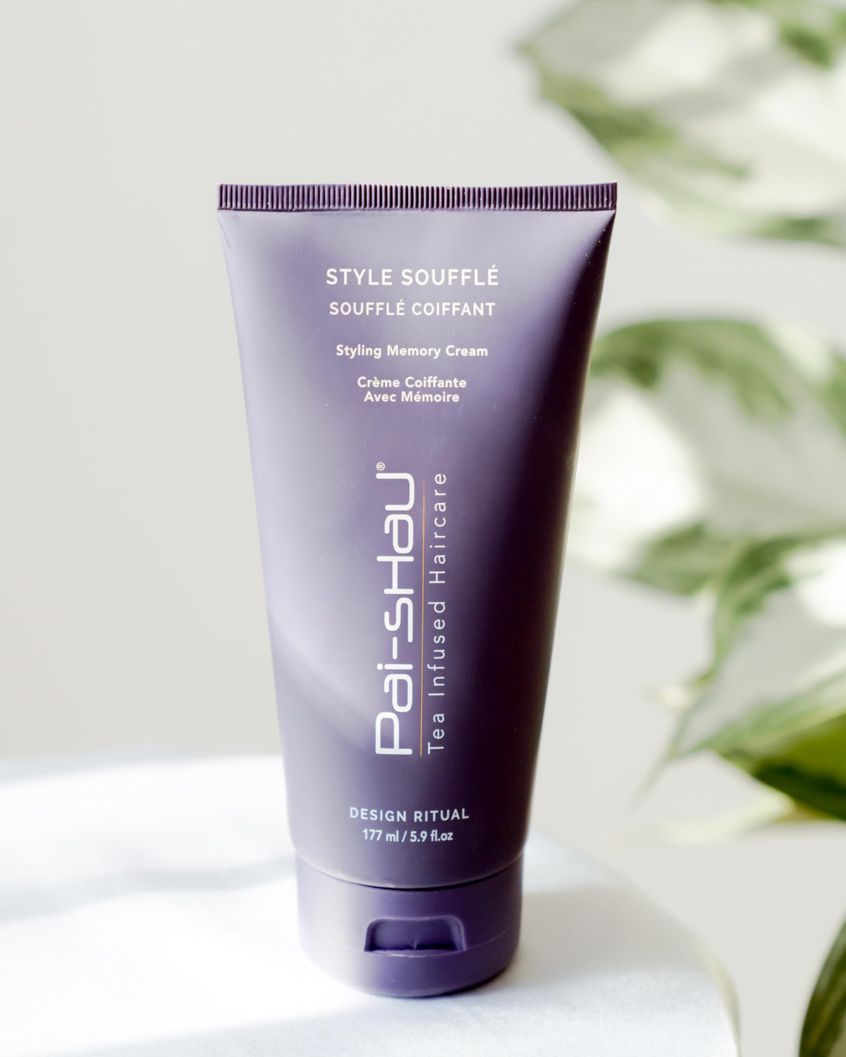Pai-Shau Style Soufflé damp hair application for shaping and moisture retention.