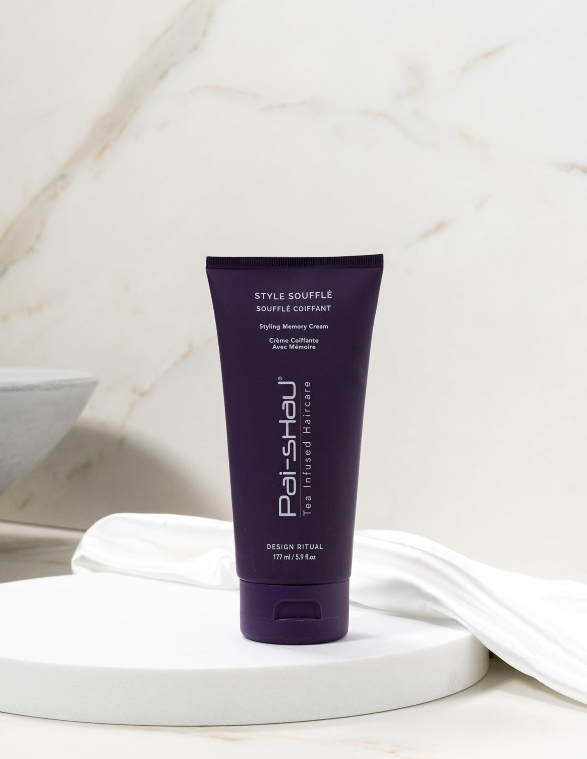 Pai-Shau Style Soufflé frizz-control formula smooths flyaways without stiffness.