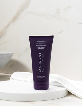 Pai-Shau Style Soufflé frizz-control formula smooths flyaways without stiffness.